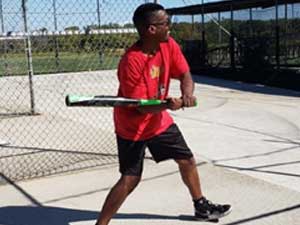 Person in batting cage